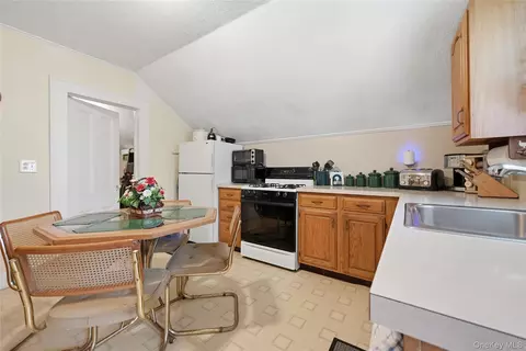 Kitchen - 68 Jayne Ave, Patchogue, NY 11772 photo 2 of 2