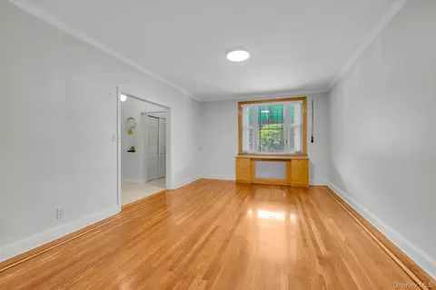 Living - 132-41 60th Ave, Flushing, NY 11355 photo 1 of 2