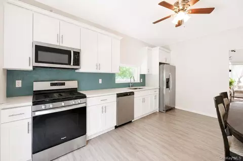 Kitchen - 71 Barton Ave, Patchogue, NY 11772 photo 1 of 1