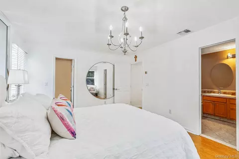 Bedroom - 15 Cedar Ln, Brookhaven, NY 11772 photo 2 of 4