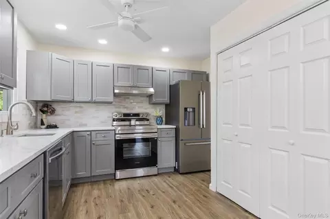 Kitchen - 91 Circle Dr W, Patchogue, NY 11772 photo 2 of 3