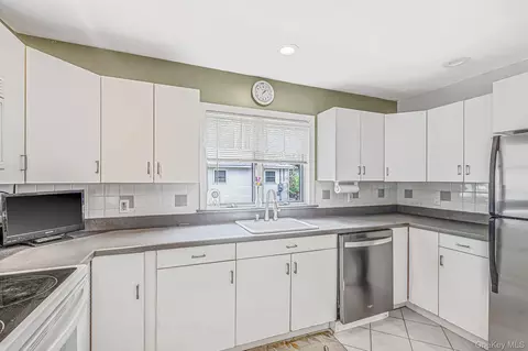 Kitchen - 35 E 6th St, Patchogue, NY 11772 photo 2 of 3