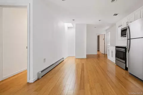Living - 738 E 217th St, New York, NY 10467 photo 2 of 2