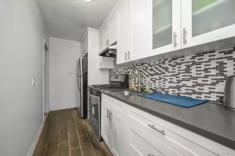 Kitchen - 144-24 72nd Ave #45B, Flushing, NY 11367 photo 2 of 2