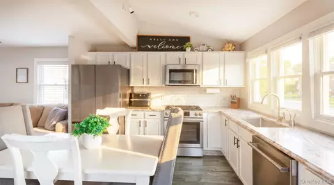 Kitchen - 27 Wood Ave, Patchogue, NY 11772 photo 1 of 2