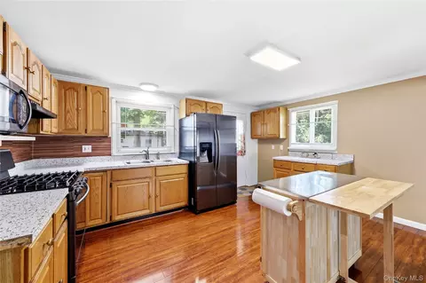 Kitchen - 211 Hampton Ave, Mastic, NY 11950 photo 4 of 4