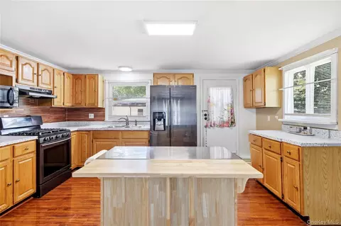 Kitchen - 211 Hampton Ave, Mastic, NY 11950 photo 2 of 4
