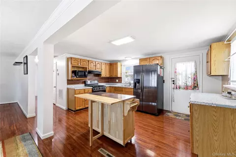 Kitchen - 211 Hampton Ave, Mastic, NY 11950 photo 1 of 4