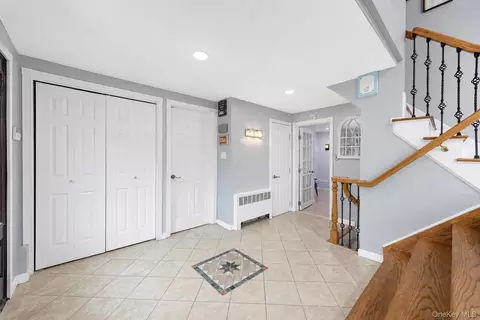 Entry Way - 49 Village Dr, Jericho, NY 11753 photo 1 of 3
