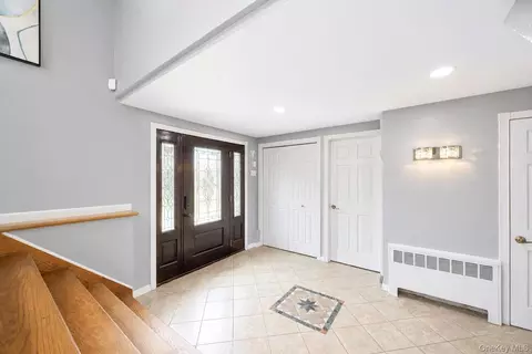 Entry Way - 49 Village Dr, Jericho, NY 11753 photo 1 of 4