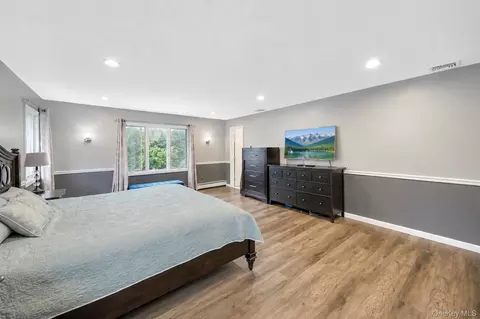 Bedroom - 49 Village Dr, Jericho, NY 11753 photo 2 of 9