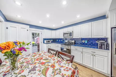 Kitchen - 24 Wiggins Ave, Patchogue, NY 11772 photo 3 of 4