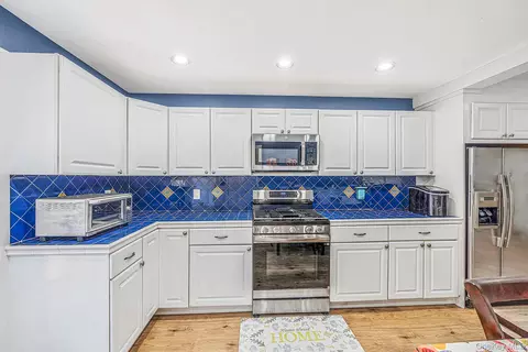 Kitchen - 24 Wiggins Ave, Patchogue, NY 11772 photo 4 of 4
