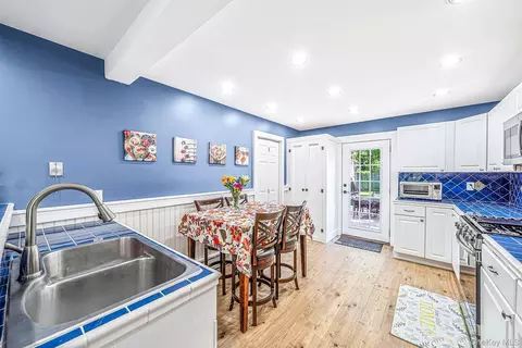 Kitchen - 24 Wiggins Ave, Patchogue, NY 11772 photo 2 of 4