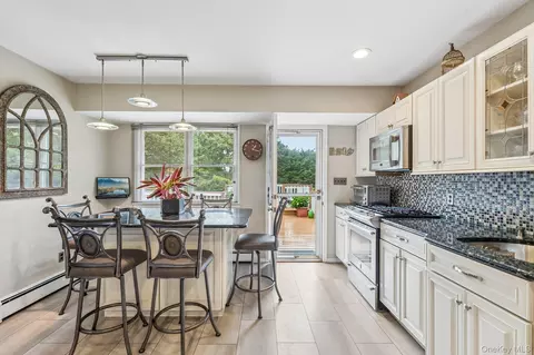 Kitchen - 302 Maple Ave, Patchogue, NY 11772 photo 3 of 3