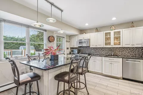 Kitchen - 302 Maple Ave, Patchogue, NY 11772 photo 1 of 3