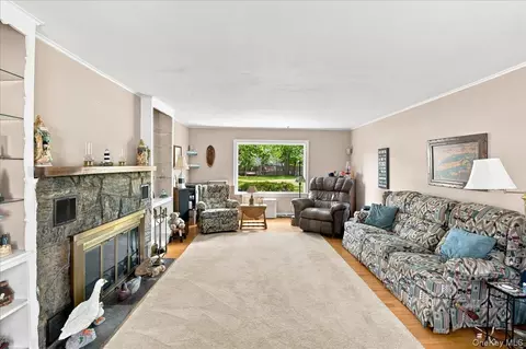 Living - 297 Maple Ave, Patchogue, NY 11772 photo 1 of 2