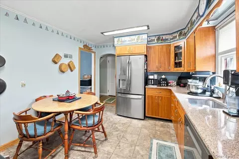 Kitchen - 297 Maple Ave, Patchogue, NY 11772 photo 2 of 2