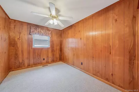 Bedroom - 1 E Jackwill Rd, Brookhaven, NY 11772 photo 2 of 3