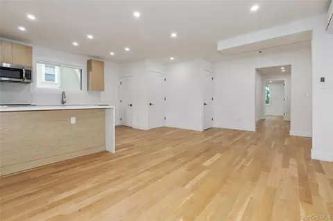 Living - 310 150th St, New York, NY 11357 photo 2 of 6