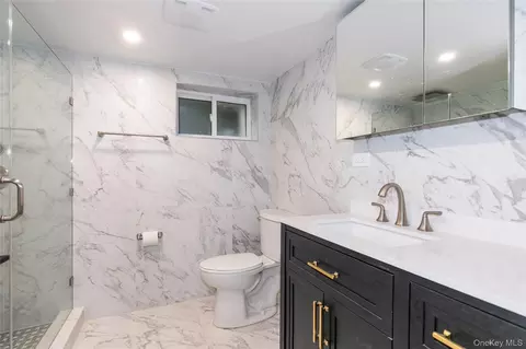 Bath - 310 150th St, New York, NY 11357 photo 3 of 4