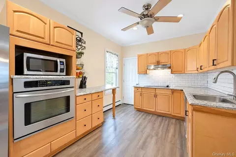 Kitchen - 52 Lee Ave, Patchogue, NY 11772 photo 2 of 3