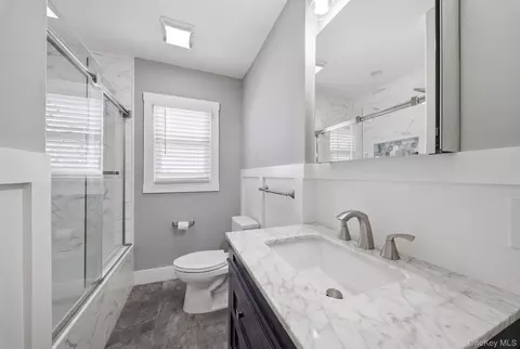 Bath - 18 Devon Rd, Bethpage, NY 11714 photo 1 of 2