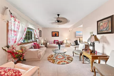 Living - 124 E Woodside Ave, Patchogue, NY 11772 photo 2 of 2