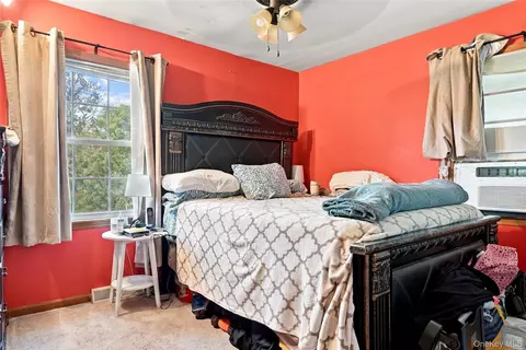 Bedroom - 124 E Woodside Ave, Patchogue, NY 11772 photo 2 of 3