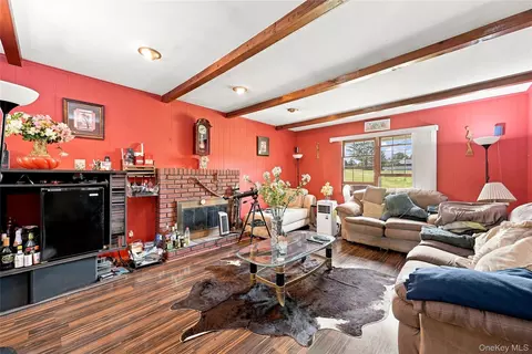 Living - 124 E Woodside Ave, Patchogue, NY 11772 photo 1 of 2