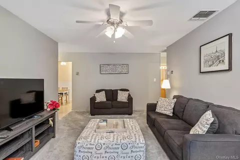 Living - 403 Cabot Ct E, Saint James, NY 11780 photo 1 of 2