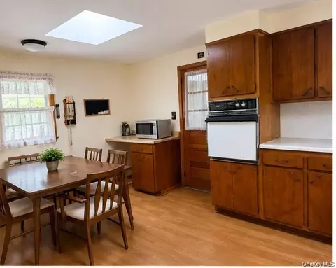 Kitchen - 39 Cleveland St, Patchogue, NY 11772 photo 2 of 2