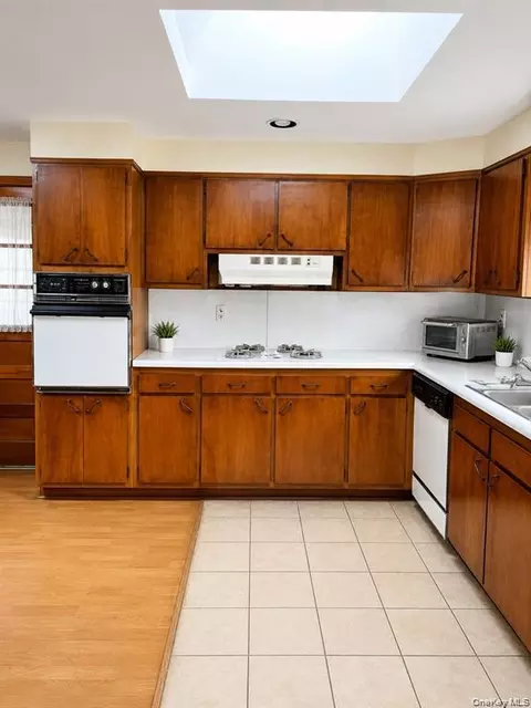 Kitchen - 39 Cleveland St, Patchogue, NY 11772 photo 1 of 2