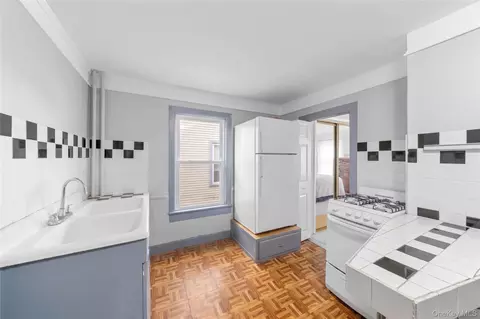 Kitchen - 120 N Ocean Ave, Patchogue, NY 11772 photo 3 of 3