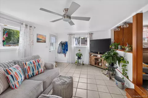 Living - 48 Silver St, Patchogue, NY 11772 photo 1 of 1