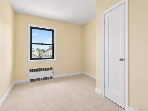 Bedroom - 75-79 181st St, New York, NY 11366 photo 5 of 6