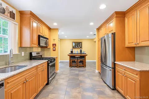 Kitchen - 344 Barton Ave, Brookhaven, NY 11772 photo 3 of 3
