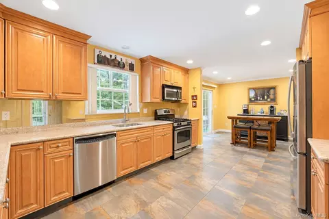 Kitchen - 344 Barton Ave, Brookhaven, NY 11772 photo 2 of 3