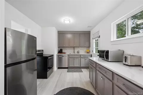 Kitchen - 138 W Tiana Rd, Hampton Bays, NY 11946 photo 1 of 2