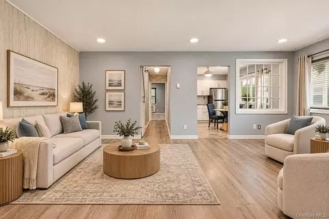 Living - 40 W 4th St #214, Patchogue, NY 11772 photo 1 of 4
