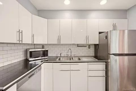 Kitchen - 40 W 4th St #214, Patchogue, NY 11772 photo 2 of 2
