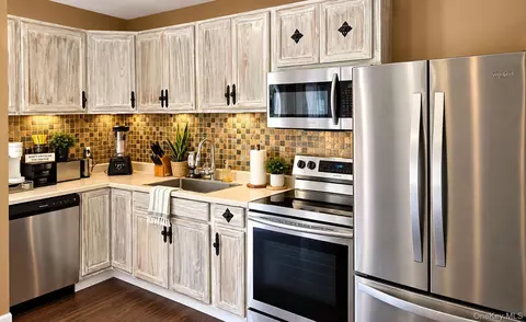 Kitchen - 39 Orchid Rd, Patchogue, NY 11772 photo 2 of 2