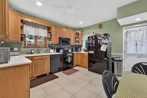 Kitchen - 69 Robert St, Patchogue, NY 11772 photo 1 of 2