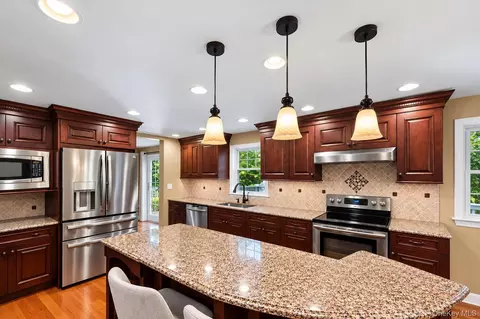 Kitchen - 413 Hewlett Ave, Patchogue, NY 11772 photo 4 of 5