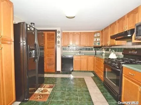 2 College Hills Dr, Farmingville, NY 11738