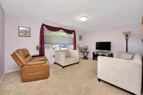 18-07 212th St #105, Bayside, NY 11360