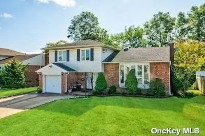 1128 Bernard Dr, Westbury, NY 11590