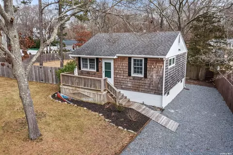 63 Wauwepex Trl, Ridge, NY 11961