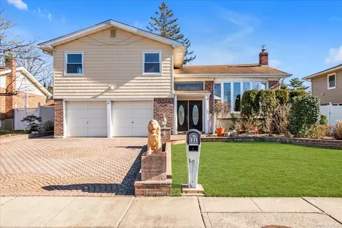 31 Robbins Ln, Westbury, NY 11590