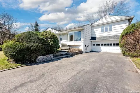 65 Blue Bird Dr, Great Neck, NY 11023